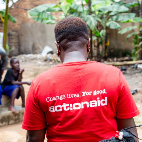 A person wearing an ActionAid t-shirt