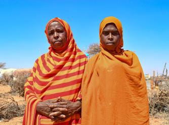 Saafi ilan Waa Raage (left), a displaced mother living in Giro-Sumo IDP Camp, Somalailfn