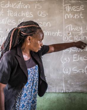 Abebi teaches in a Nigerian primary school with no electricity or water and with no working toilet.