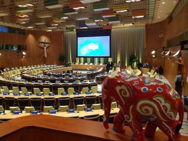 A model elephant in a large meeting hall