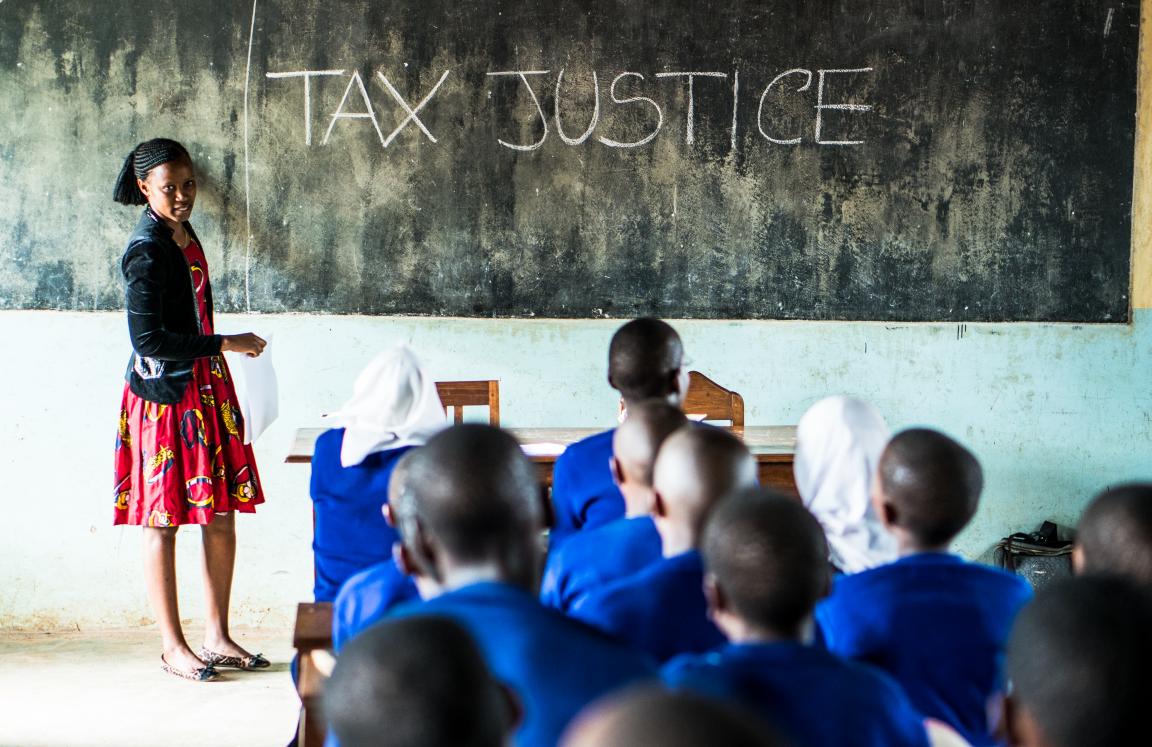 Hearing-impaired girls learning about education funding through tax justice in Tanzania.